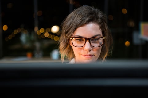 Close-up of businesswoman working on computer at her desk in the office