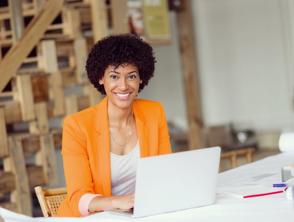 Young female engineer working in office