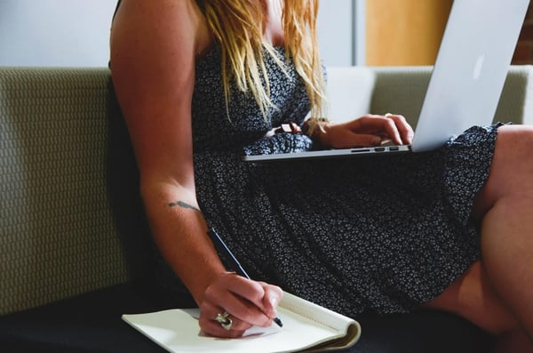 woman on laptop microlearning with LMS software