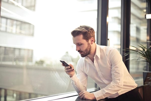 LMS BYOD man with phone